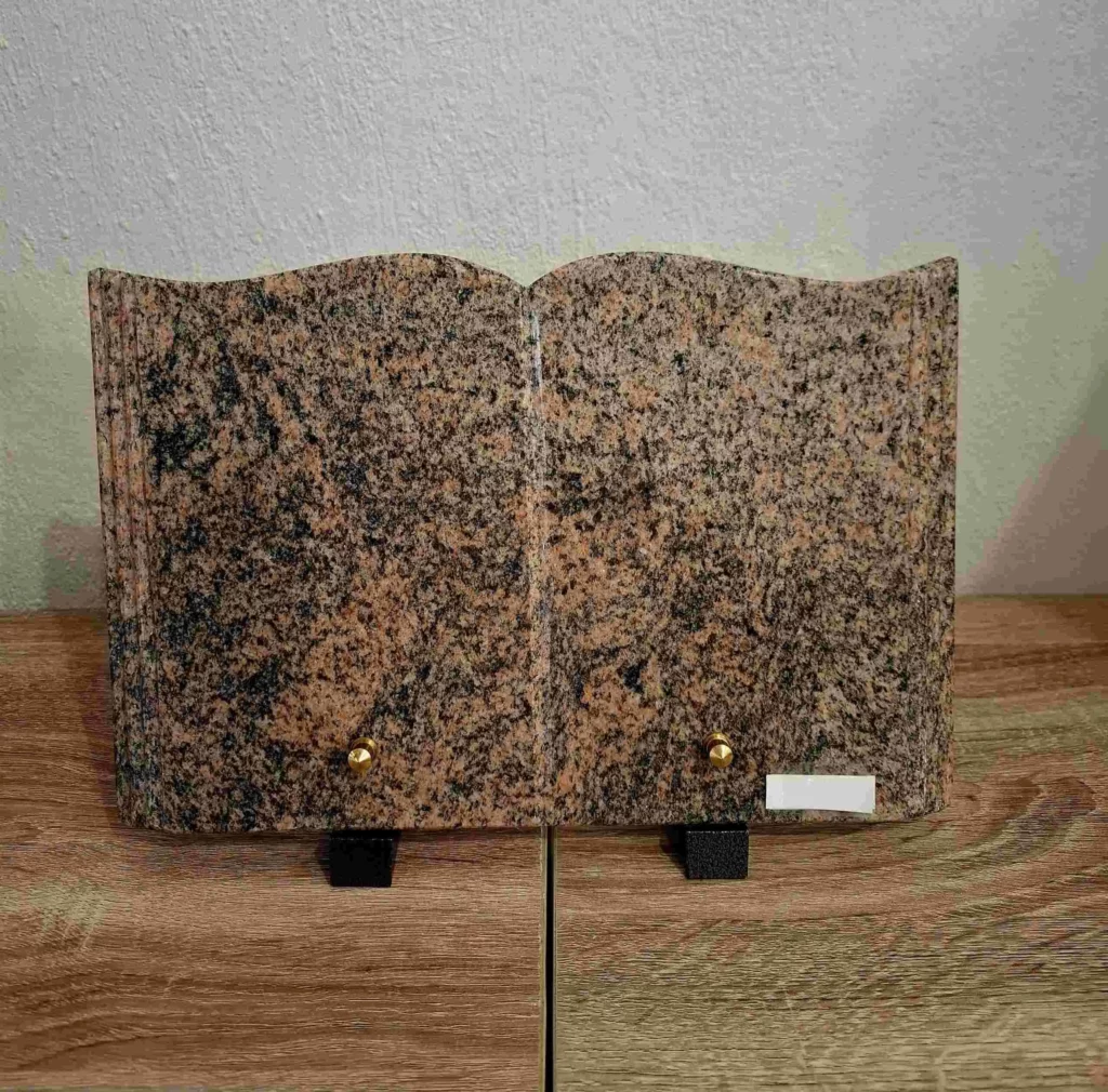 Plaque funéraire livre ouvert en granit rose Juparana